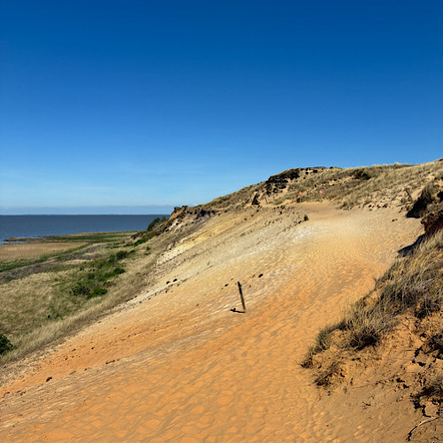 img 2025 05 17 155543 Blick auf das Morsumer Kliff, Slyt - sandiger Dünenweg mit Blick auf die Nordsee